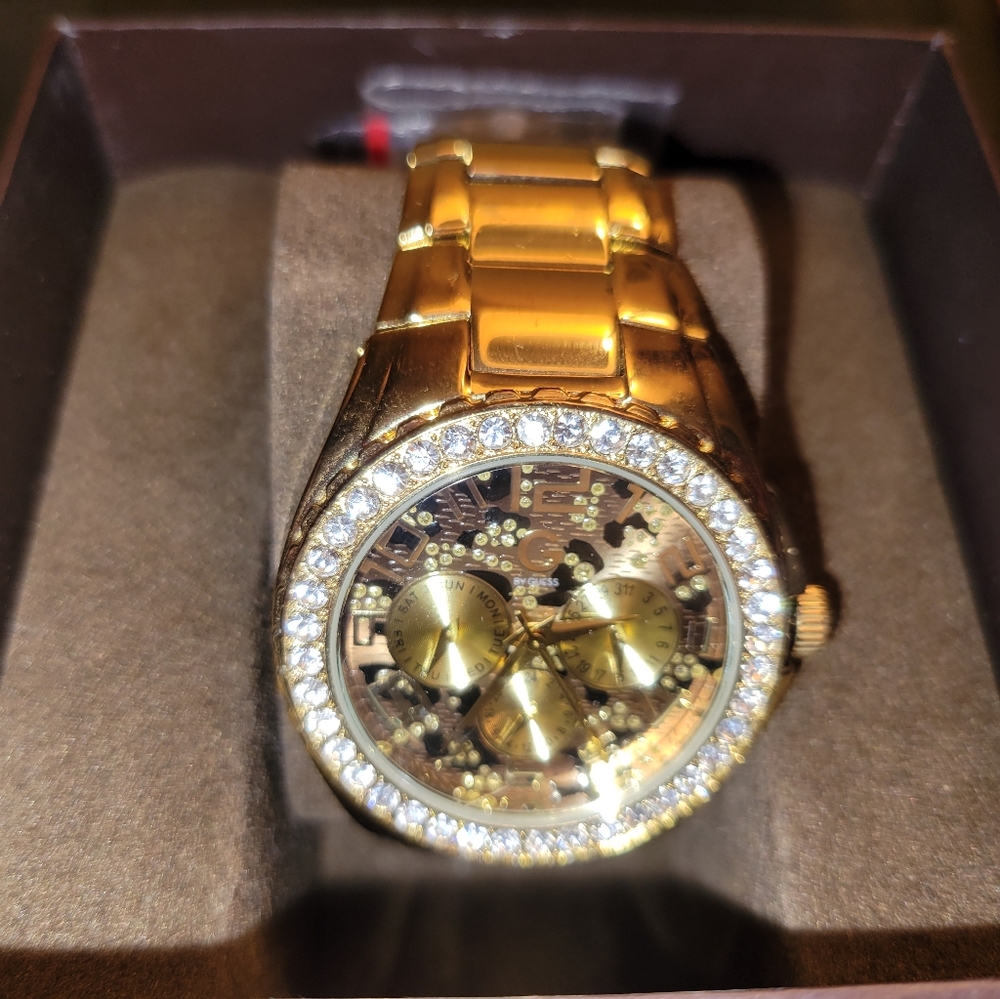 GUESS ORIGINAL watch. Animal print. Gold Toned.